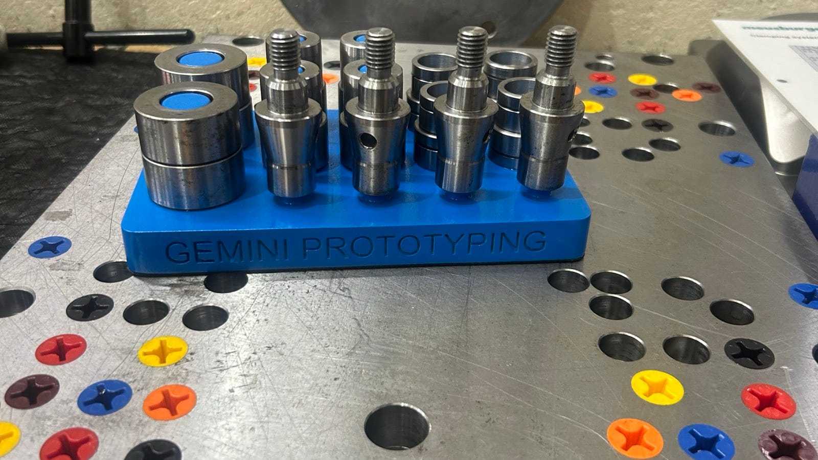 Machined inserts resting on a 3D printed holder in the Gemini tool room